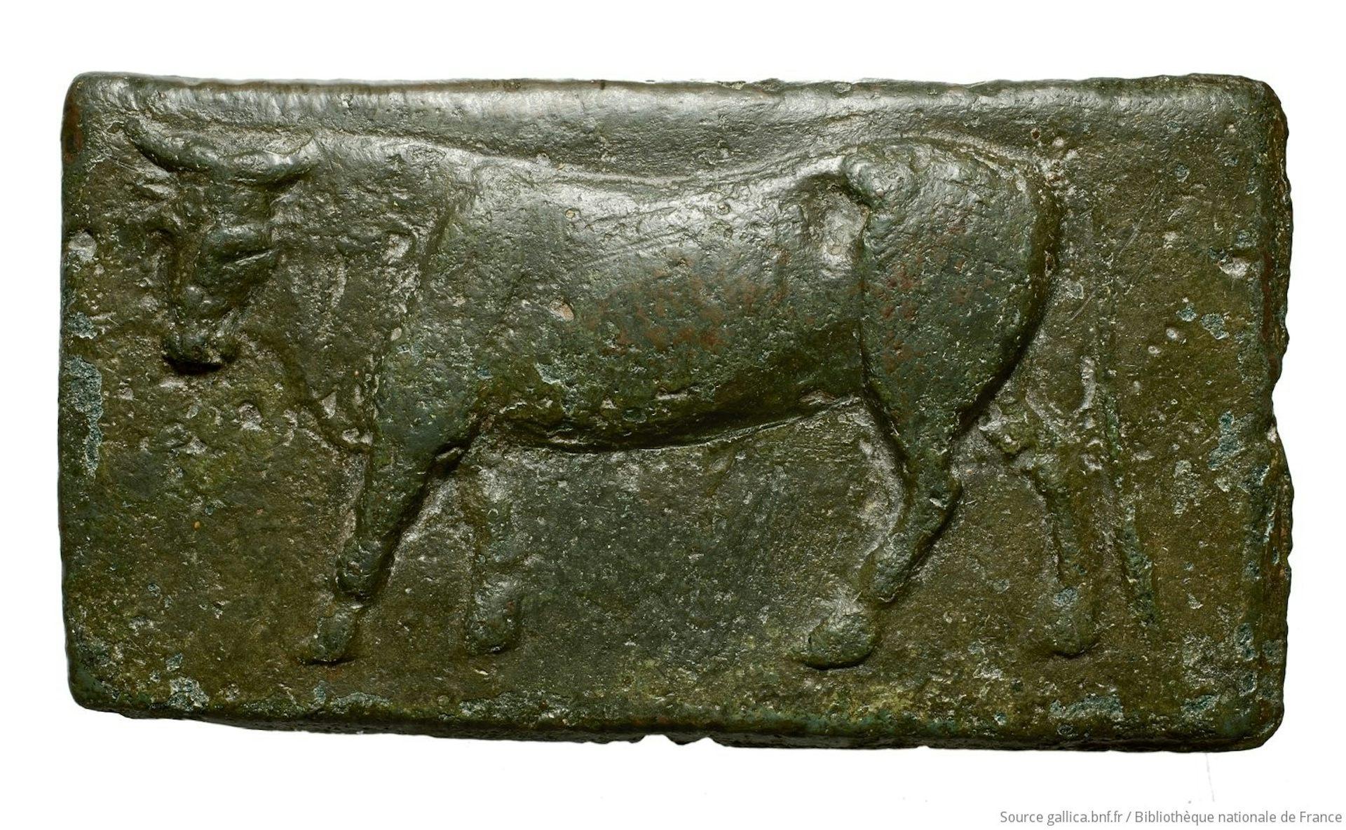 Monnaie de bronze avec un marquage en forme de bovidé