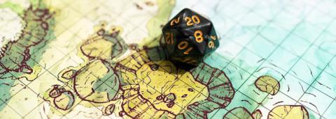 Photo d'une cartographie avec un dé